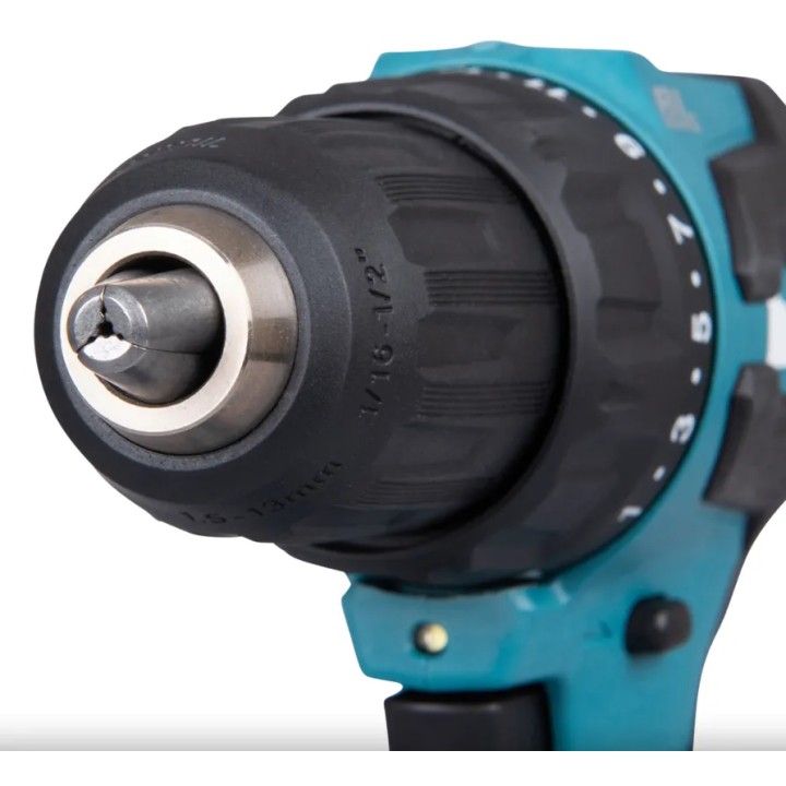 Profil arrière de la perceuse avec compartiment batterie et détail XPT